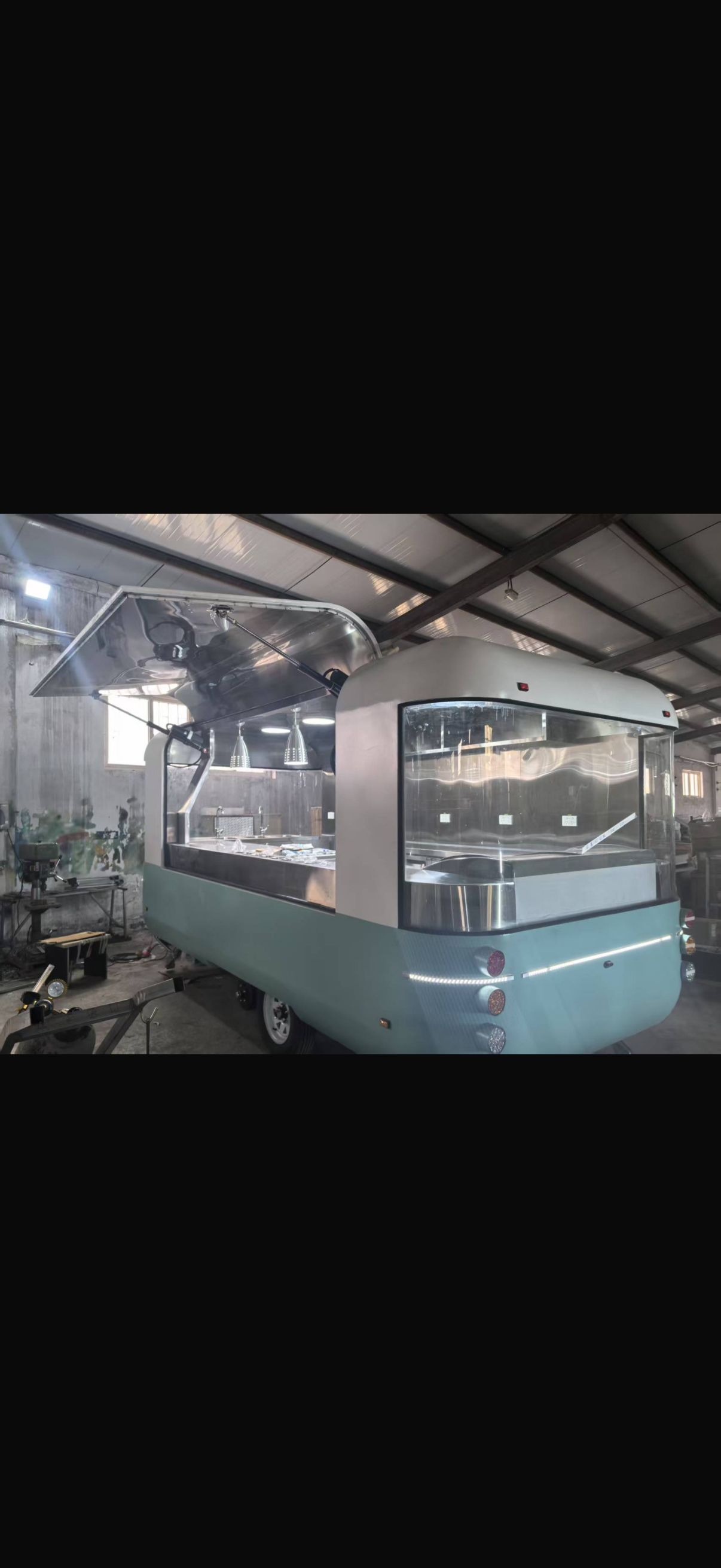 Teal retro airstream food trailer interior open