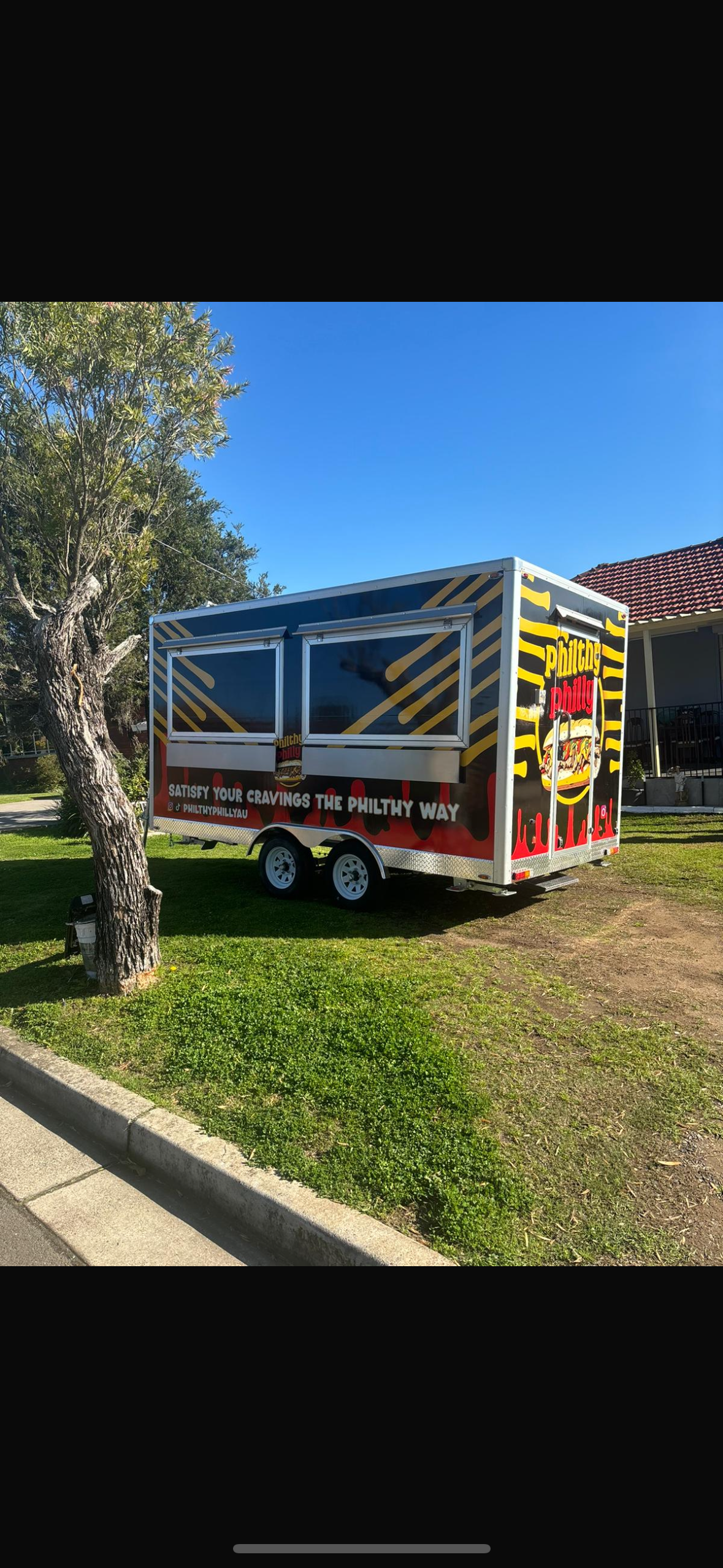 Purple food trailer side view