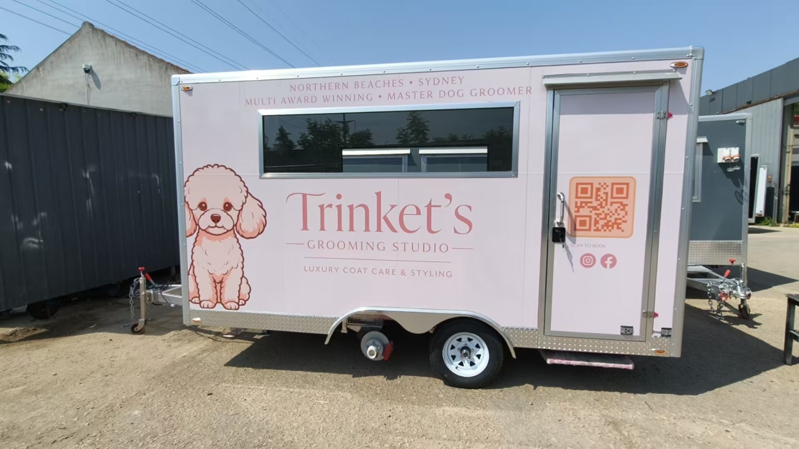 Black trailer with dual serving windows