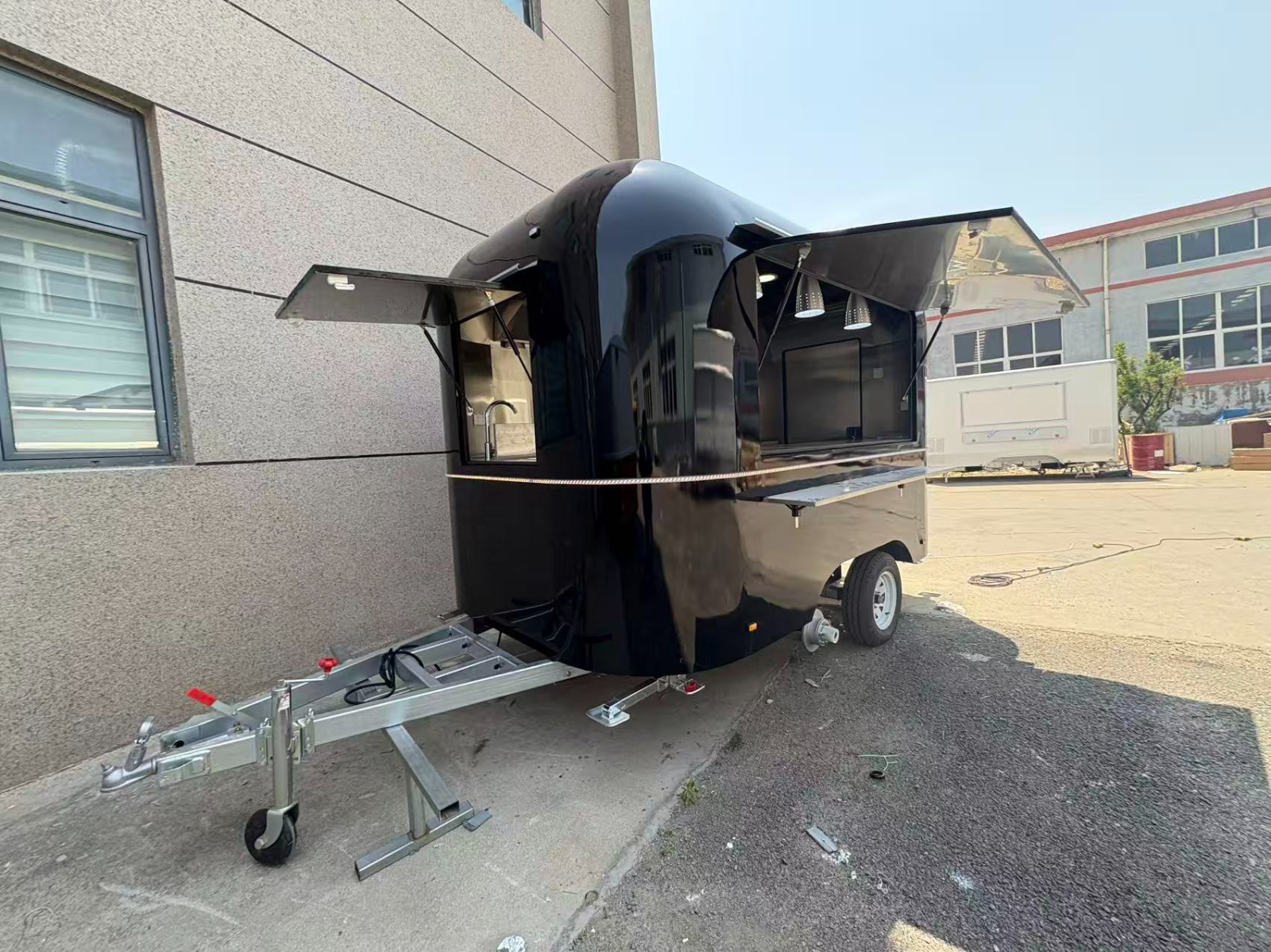 Black airstream food trailer open