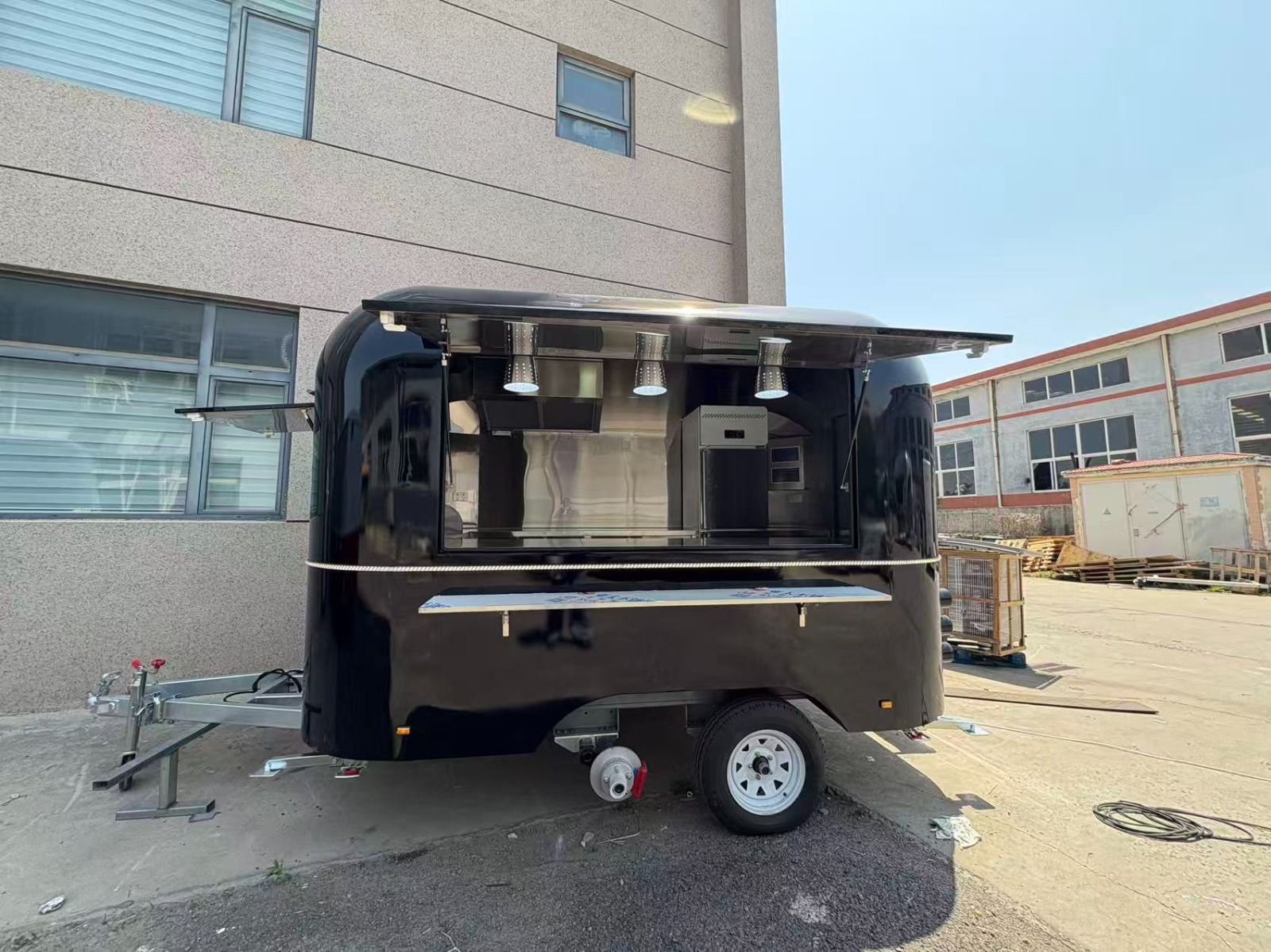 Black airstream trailer front open